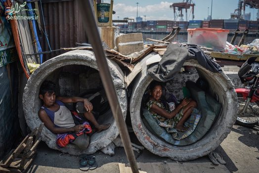 زندگی یک مرد و زن در داخل لوله زهکشی بتنی - مانیل، فیلیپین