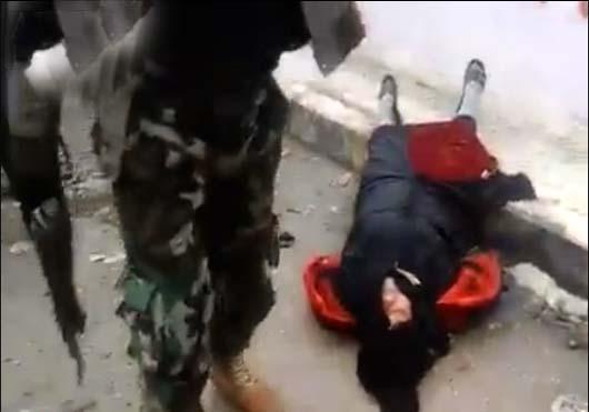 اعدام یک زن سوری توسط النصره+تصاویر