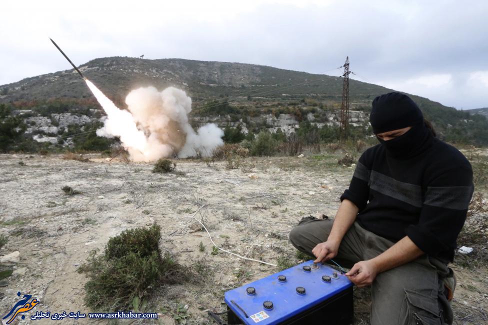 عکس/ تروریست داعشی درحال پرتاب موشک