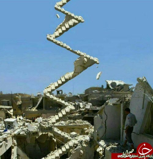 عکس/تصویری تاثیرگذار از تخریب یک ساختمان در حلب