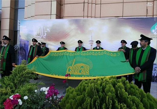 عکس/ اهتزاز پرچم امام رضا(ع) در کمیته ملی المپیک