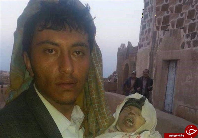 عکس/ خواب ابدی نوزاد یمنی در آغوش پدر