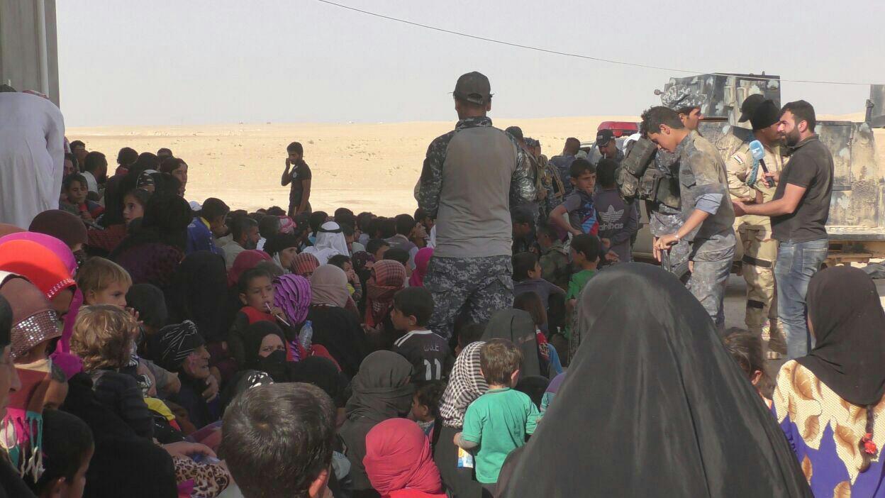 تصاویر/کمک به مردم مناطق آزادشده موصل