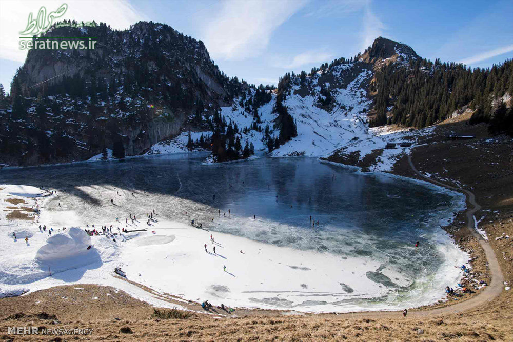عکس/تفریح سوئیسی ها روی یک دریاچه یخ زده