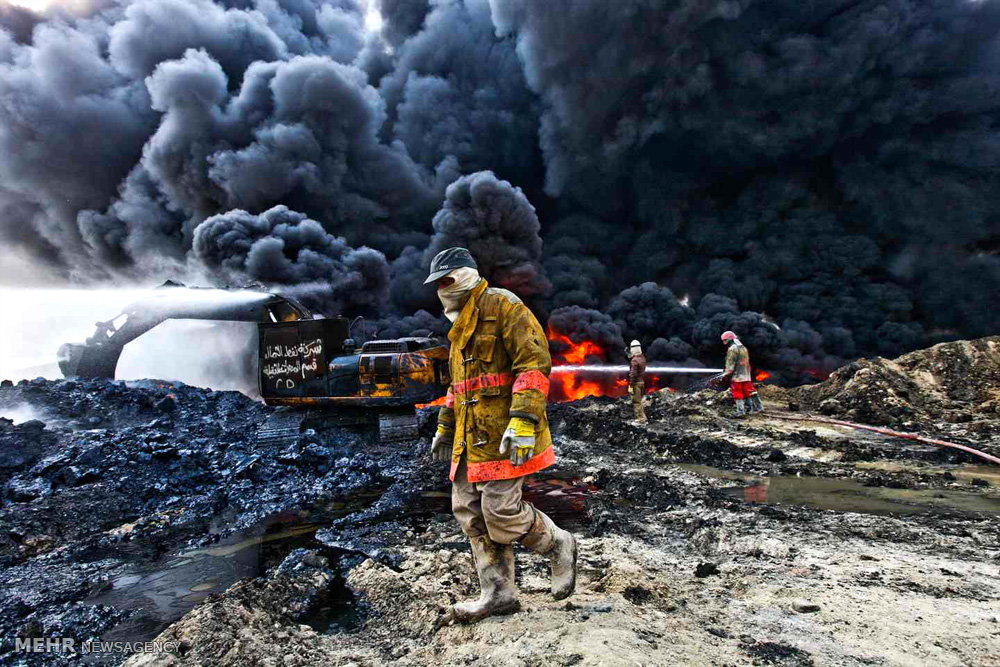 عکس/مهار آتش در چاه نفت