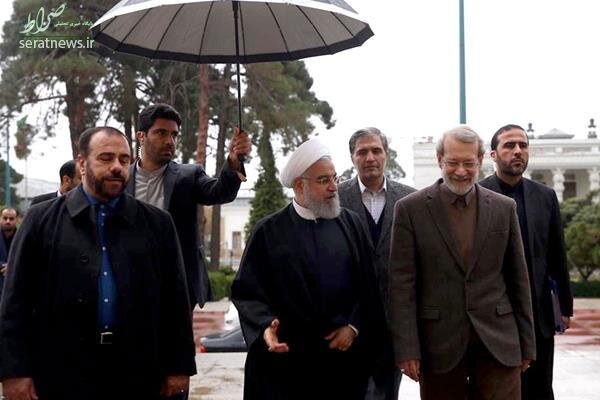عکس/ استقبال لاریجانی از روحانی زیر باران